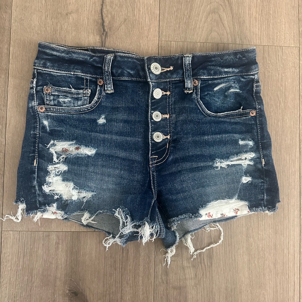 Distressed Blue Denim Jeans